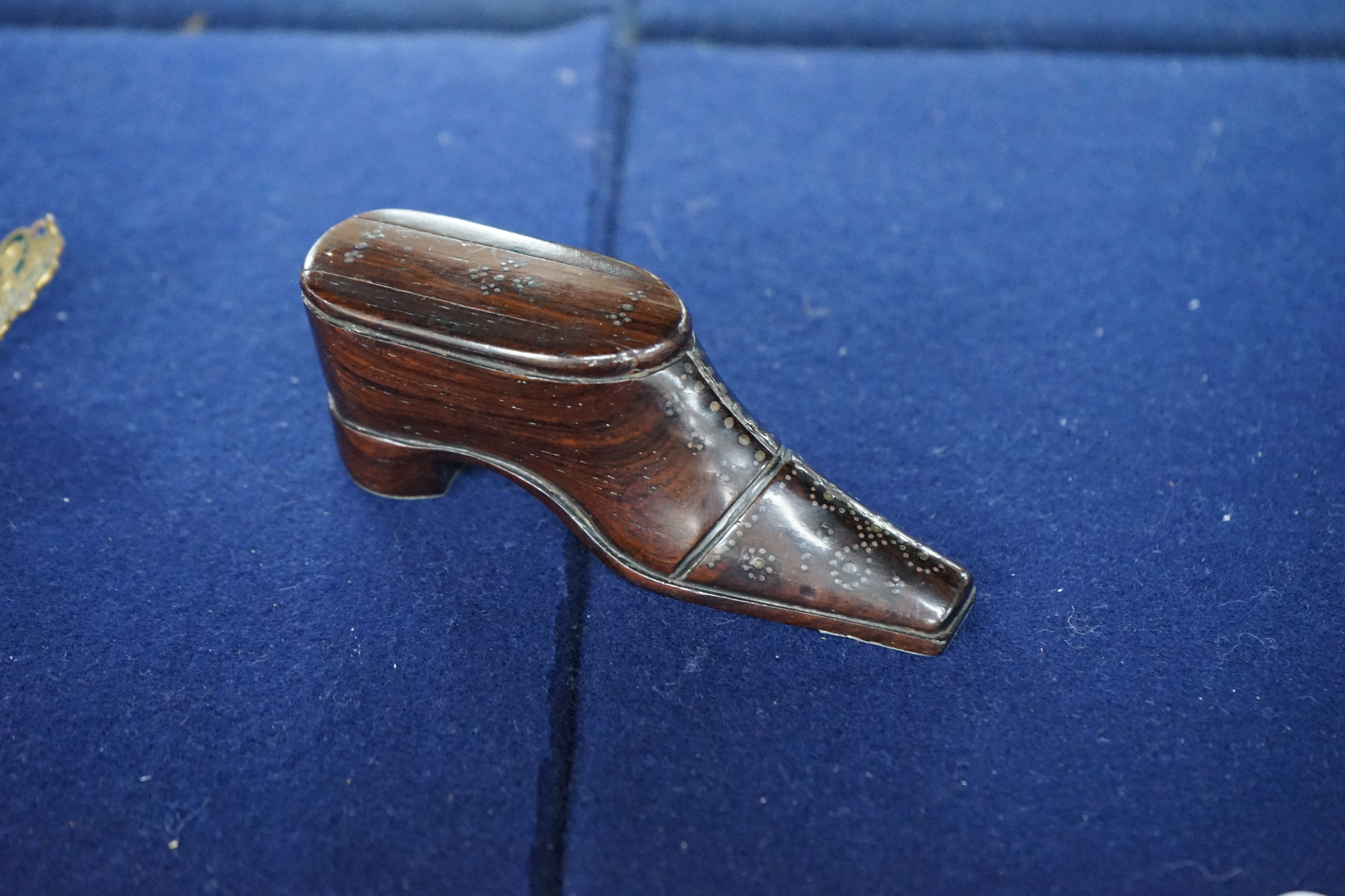 A 19th century rosewood and pique work snuff shoe, 11cm long. Condition - fair to good